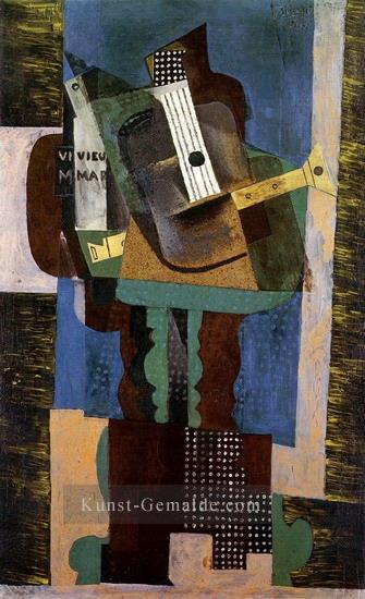 Guitare clarinette et bouteille sur une table 1916 kubimm Pablo Picasso Ölgemälde